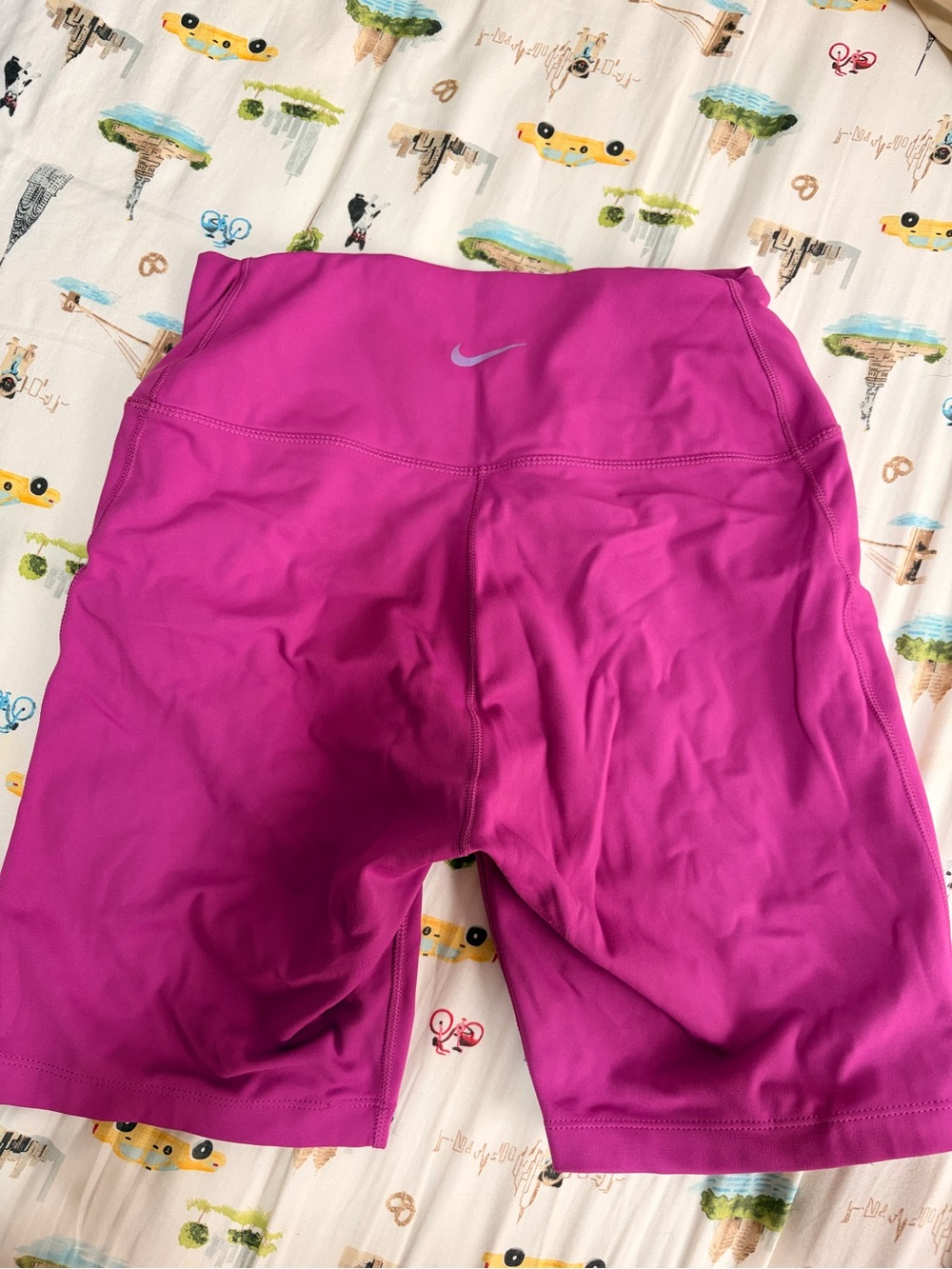 Nike Women's Magenta High-Rise Bike Shorts with Pockets and Reflective Swoosh